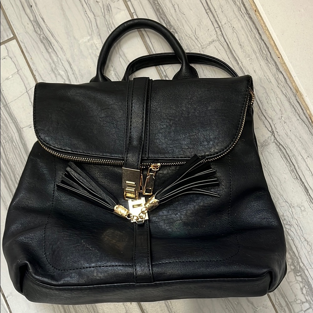 Elegant Black vegan Leather Backpack with Butterfly Clasp
